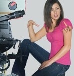 picture of filmmaker Shawna Baca at the camera